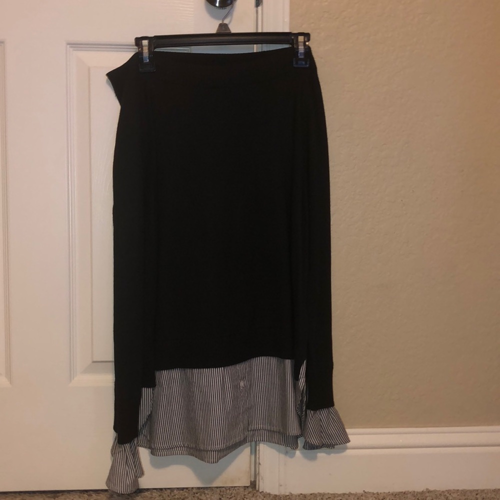 Black blouse with striped bottom and sleeves